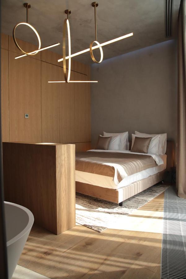 The Veil Hotel Astaná Exterior foto A bedroom at the hotel
